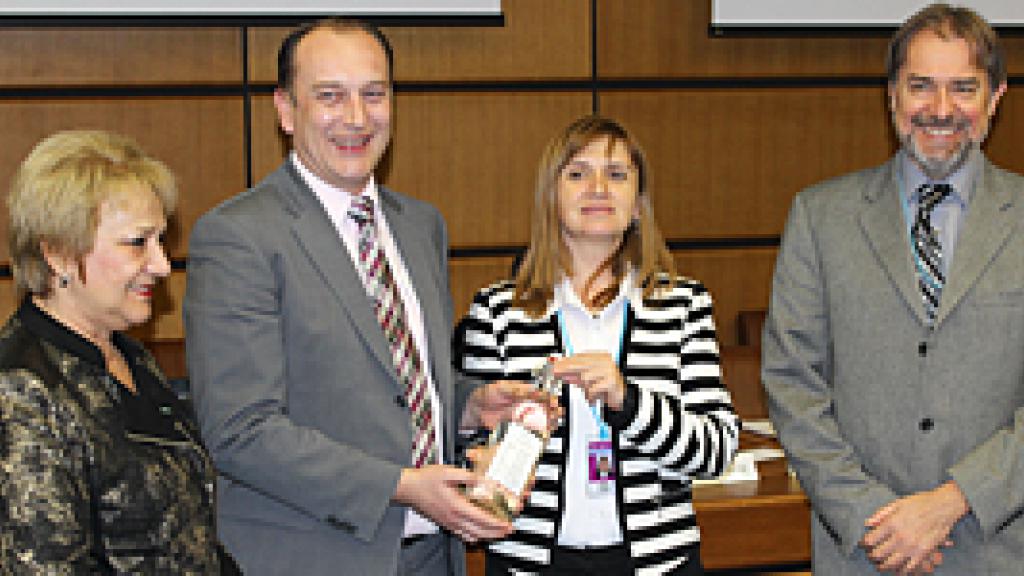 Mr. Drazen Kurecic and Ms. Emilia Kraeva pose with Danue water bottle